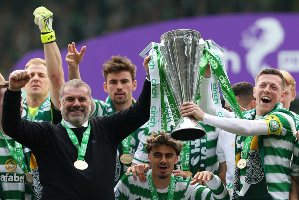Callum McGregor and Angelos Postecoglou, Manager of Celtic lift The Cinch Premiership trophy after their sides victory during the Cinch Scottish Pr...