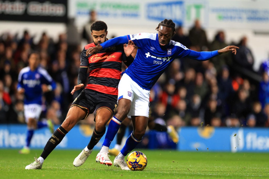 Freddie Ladapo of Ipswich Town and Jake Clarke-Salter of Queens Park Rangers compete for the ball during the Sky Bet Championship match between Ips...