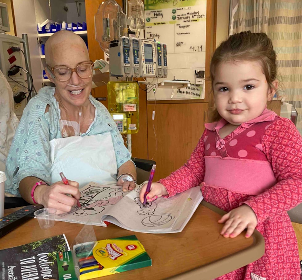 Holly in the hospital with her youngest daughter.
