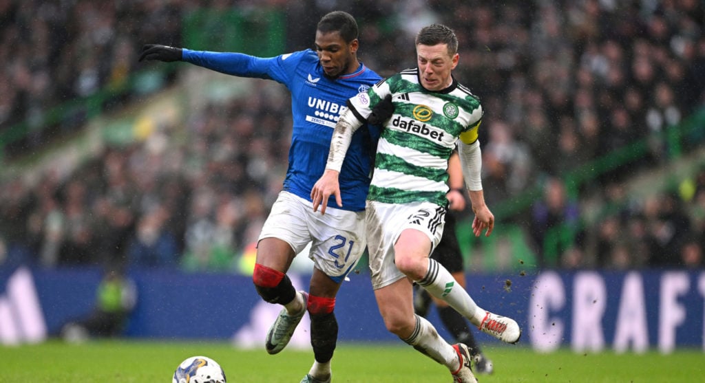Callum McGregor of Celtic challenges Dujon Sterling of Rangers during the Cinch Scottish Premiership match between Celtic FC and Rangers FC at Celt...