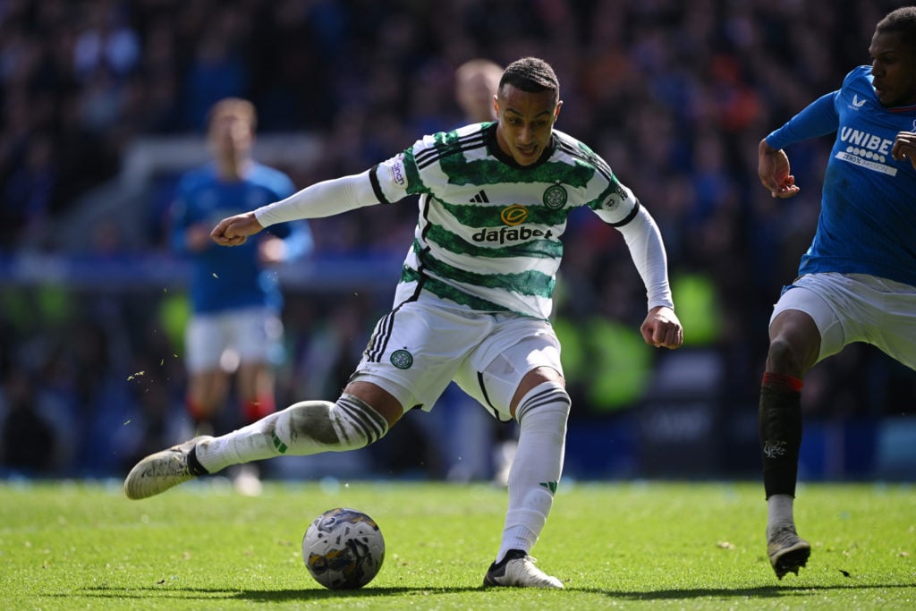 Adam Idah of Celtic scores his team's third goal during the Cinch Scottish Premiership match between Rangers FC and Celtic FC at Ibrox Stadium on A...