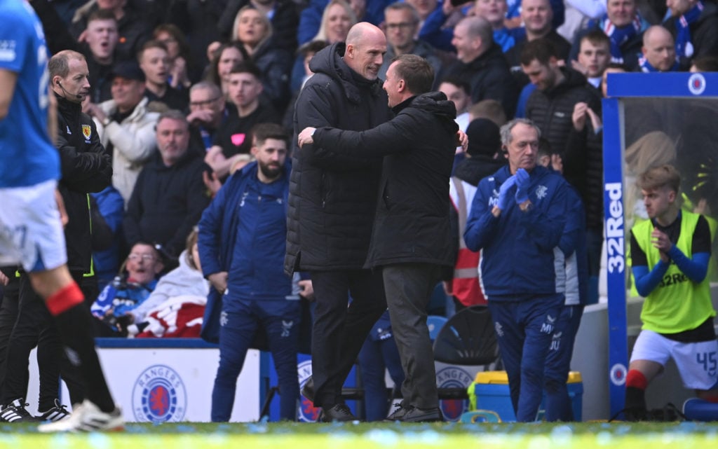 Rangers manager Philippe Clement and Celtic manager Brendan Rodgers embrace on the final whistle after the Cinch Scottish Premiership match between...