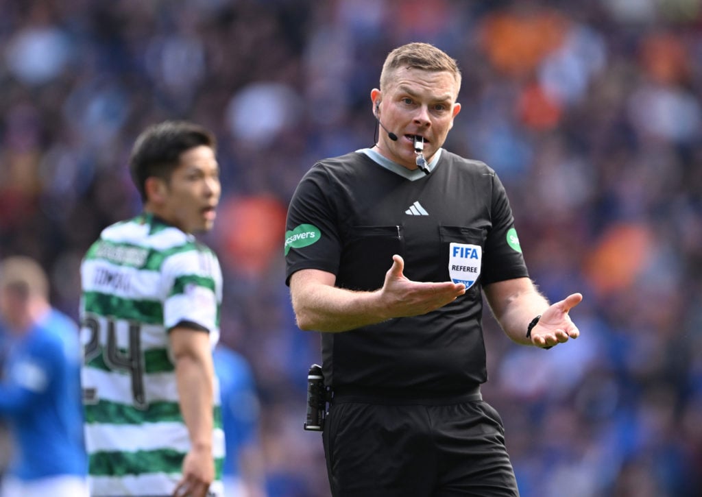 Referee John Beaton makes a decision during the Cinch Scottish Premiership match between Rangers FC and Celtic FC at Ibrox Stadium on April 07, 202...