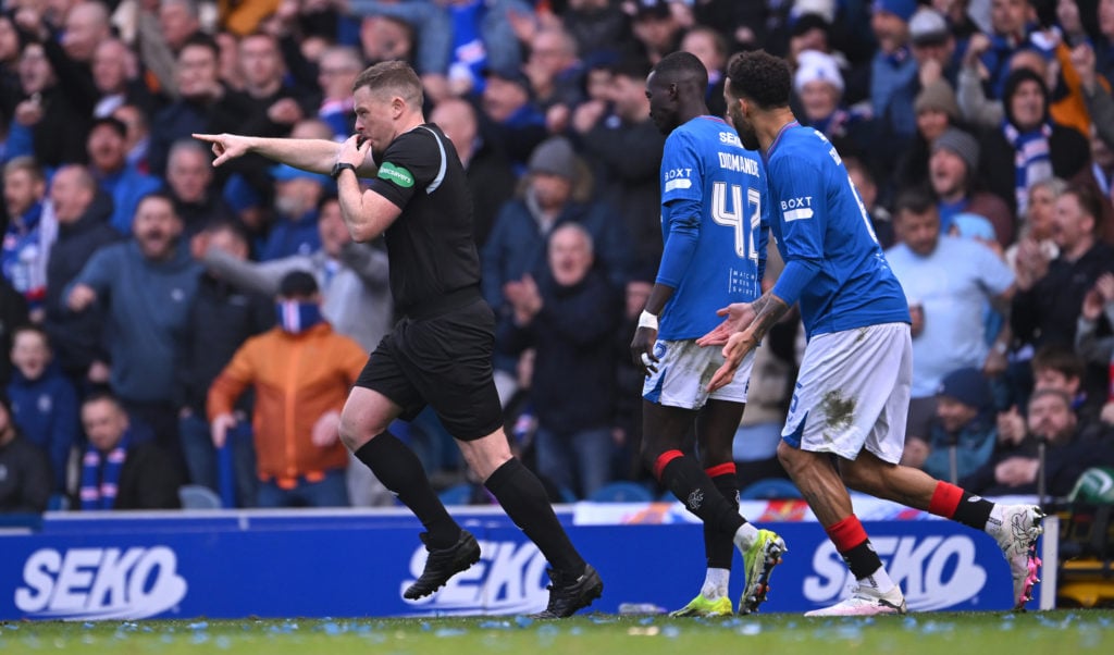 Referee John Beaton points to the penalty spot for a Rangers penalty after a VAR review during the Cinch Scottish Premiership match between Rangers...