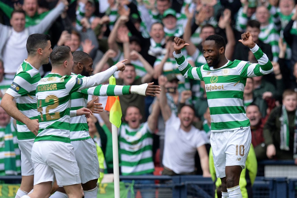 Moussa Dembele of Celtic celebrates after scoring his sides third goal with his team mates during the Scottish Cup Semi Final match between Rangers...