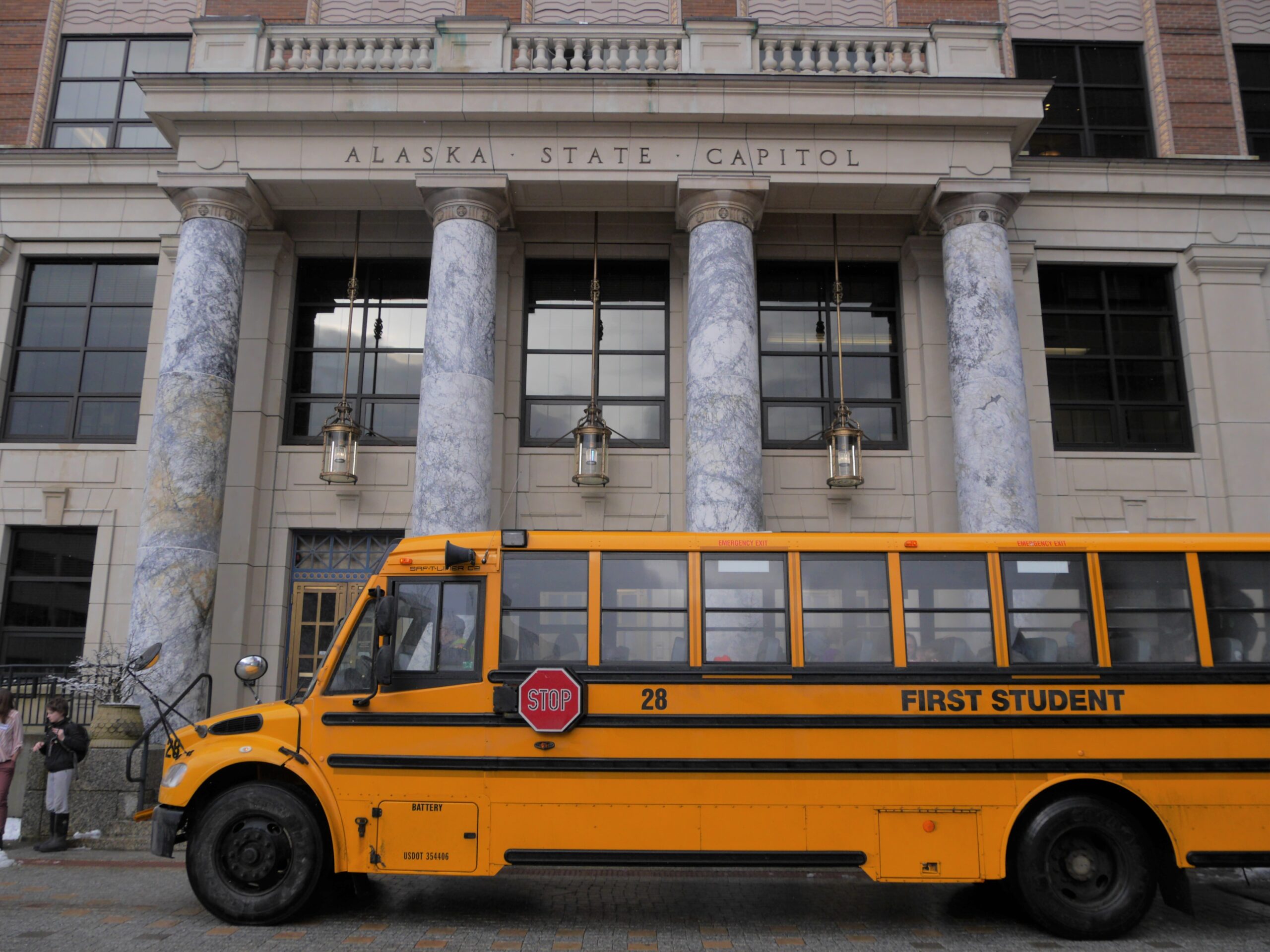 school bus in front of building